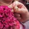 These rings were designed by one of the father's of the Bride and worn as necklaces by each daughter until the ceremony. 